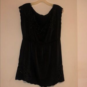 Elegant Black Sleeveless Mini Dress with beads & sequins + detailing throughout.